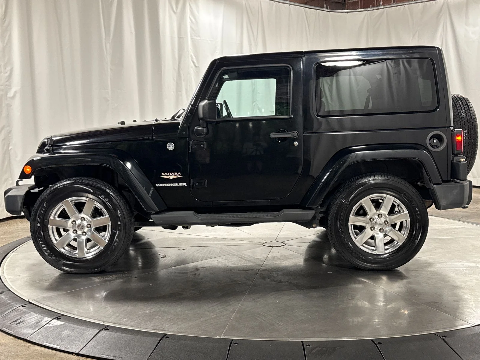 Used 2012 Black Clearcoat Jeep Sahara image 8