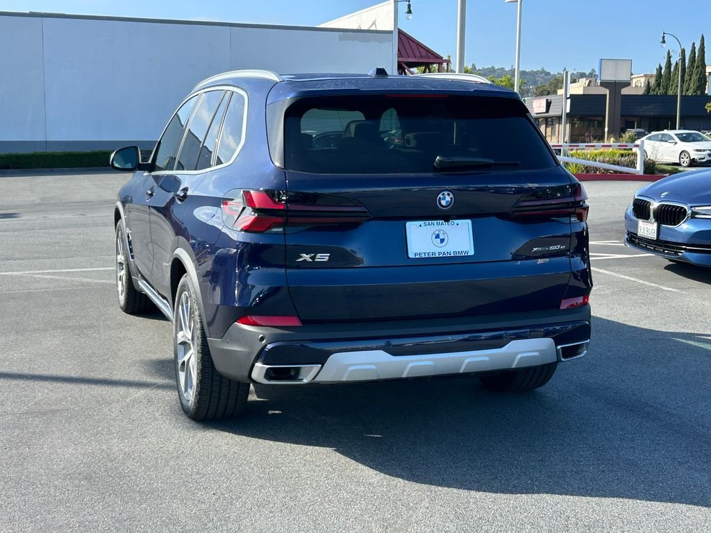 New 2026 Tanzanite Blue II Metallic BMW xDrive50e image 3