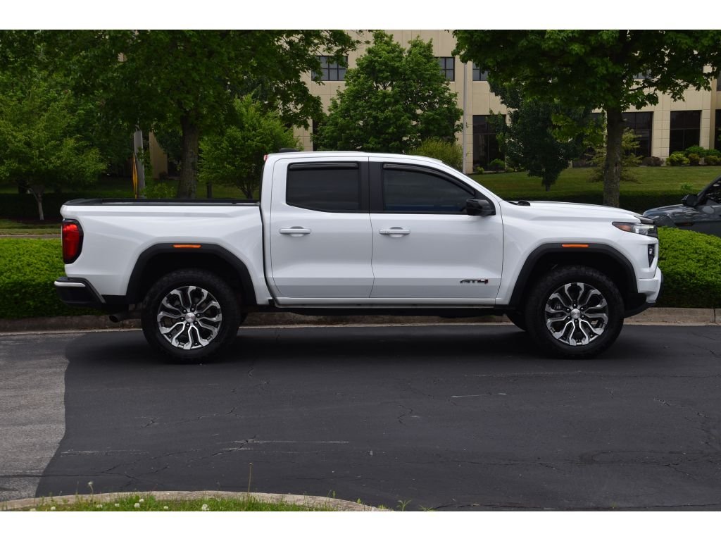 Used 2024 Summit White GMC 4WD AT4 image 3
