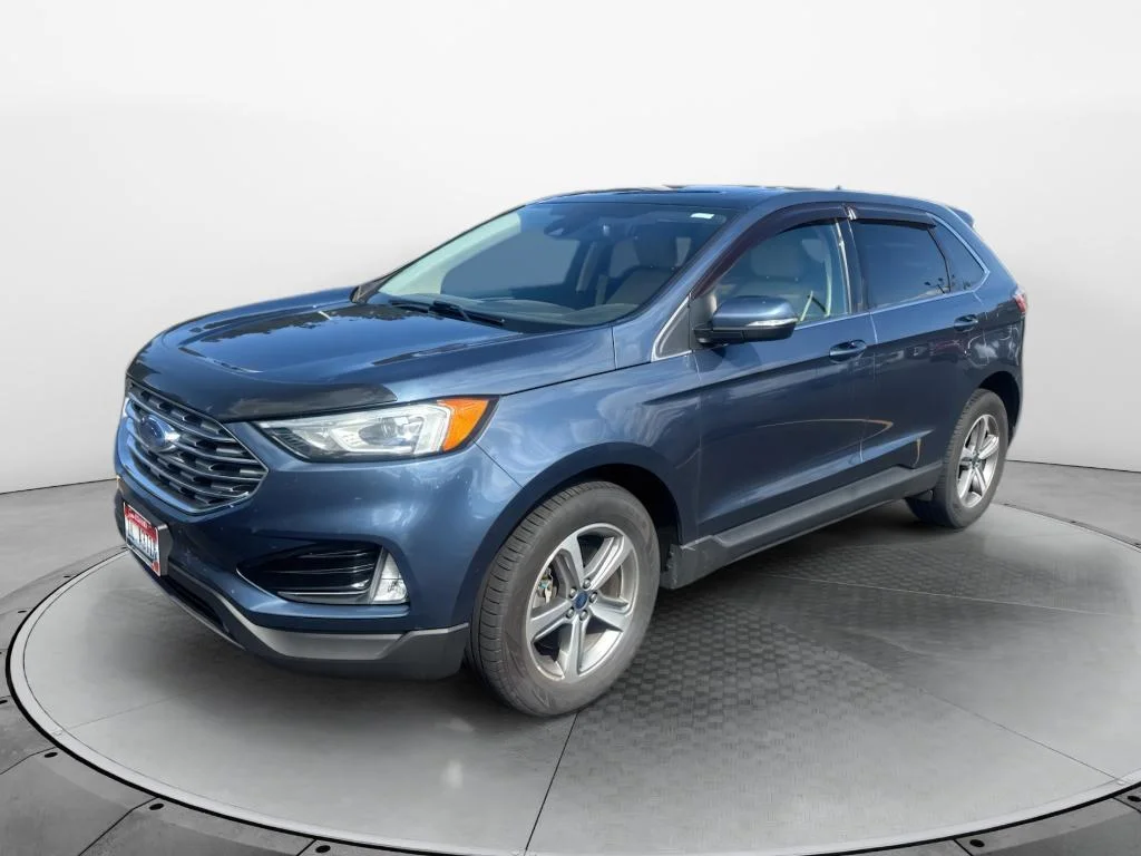 Used 2019 Blue Metallic Ford SEL image 1