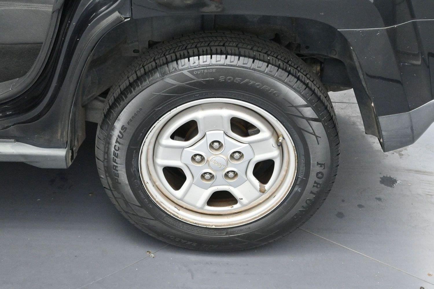 Used 2011 Brilliant Black Crystal Pearl Jeep Sport image 23