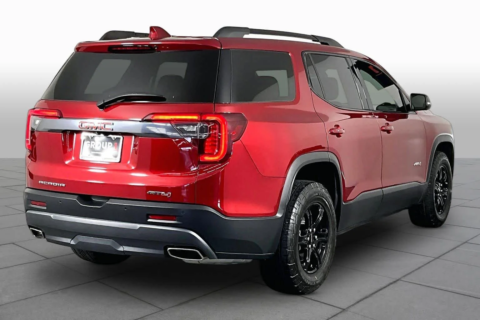 Used 2023 VOLCANIC RED TINCOAT GMC AT4 image 25