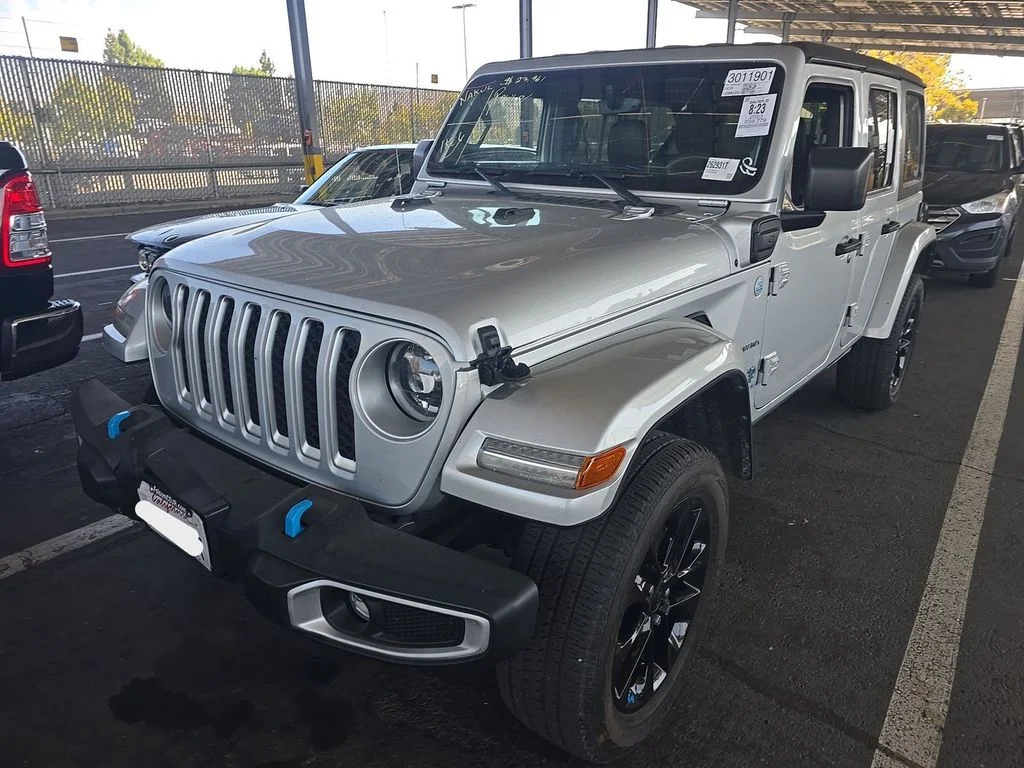 Used 2023 Silver Jeep Sahara 4xe image 1