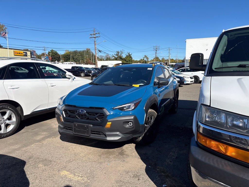 Used 2024 Blue Subaru Wilderness image 1