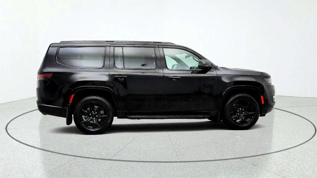 Used 2025 Diamond Black Crystal Pearlcoat Jeep Series II Carbide 4x4 w/ Rear Entertainment & 20