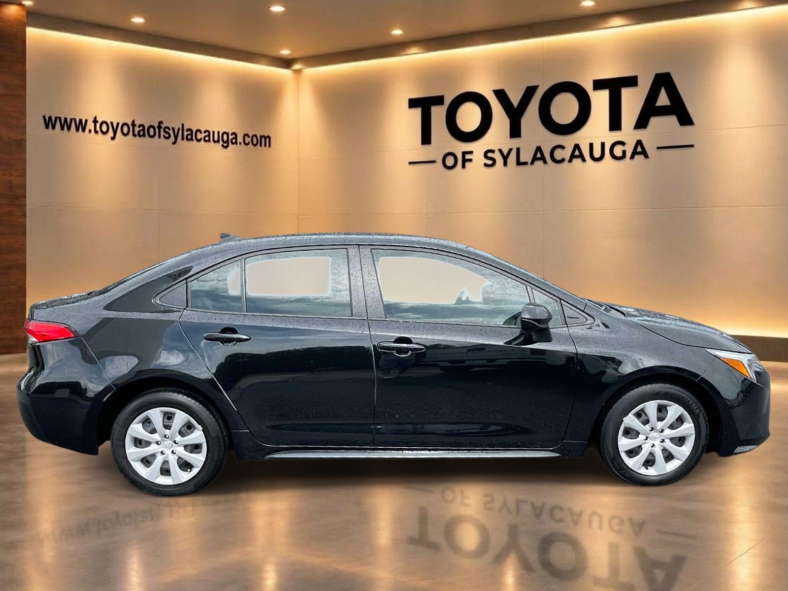 Used 2025 Midnight Black Metallic Toyota Hybrid LE image 2
