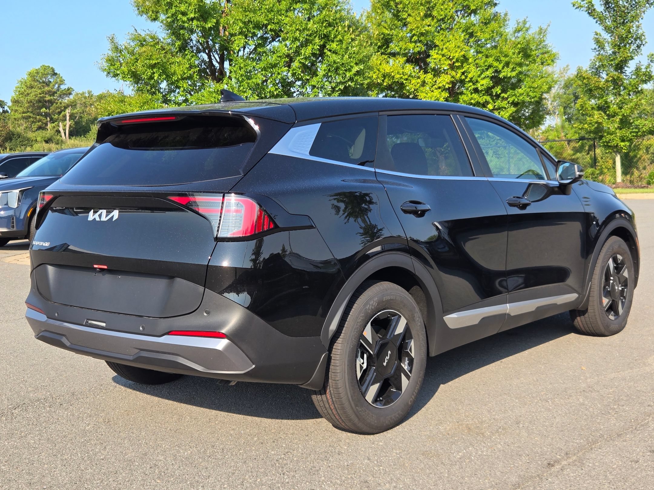 New 2026 Ebony Black Kia LX image 7