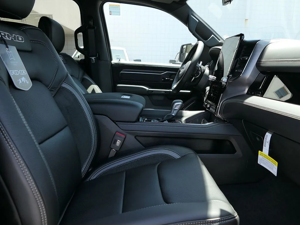 New 2026 Diamond Black Crystal Pearl Coat RAM RHO Crew Cab 4x4 5