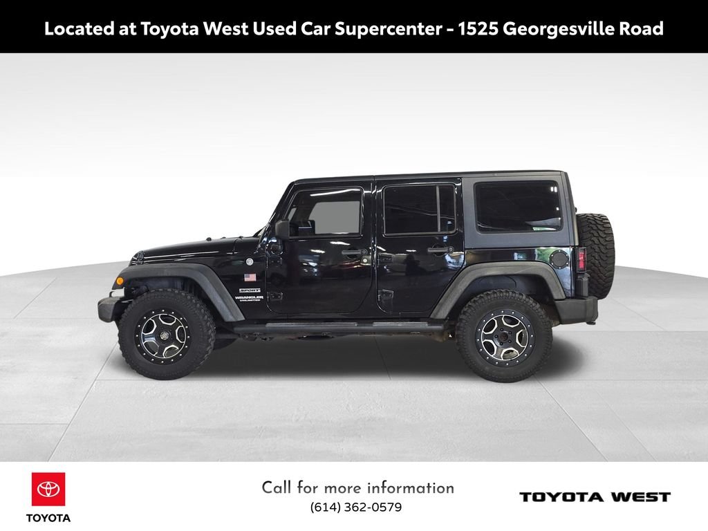 Used 2013 Black Jeep Unlimited Sport image 10