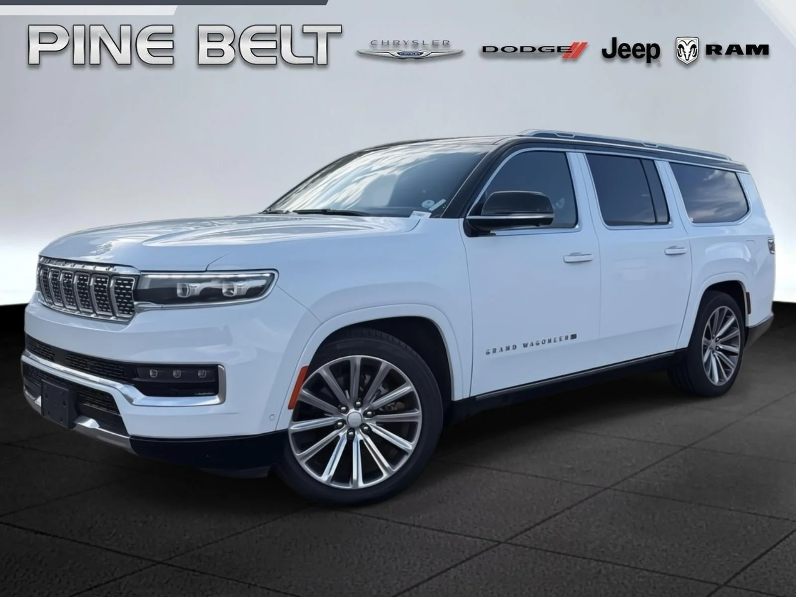 Used 2023 Bright White Clearcoat Jeep Series II image 1