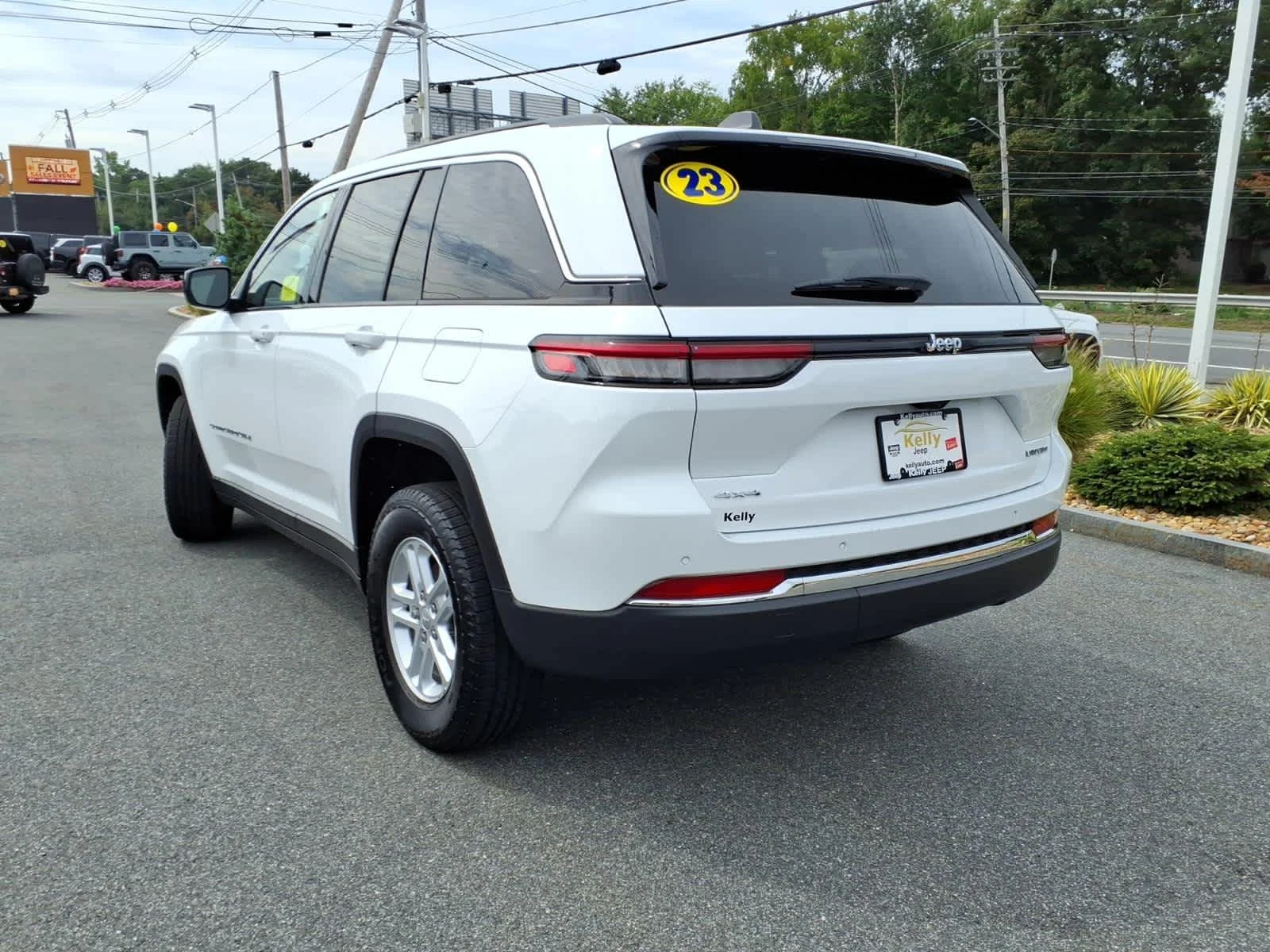 Used 2023 Bright White Clearcoat Jeep Laredo image 11