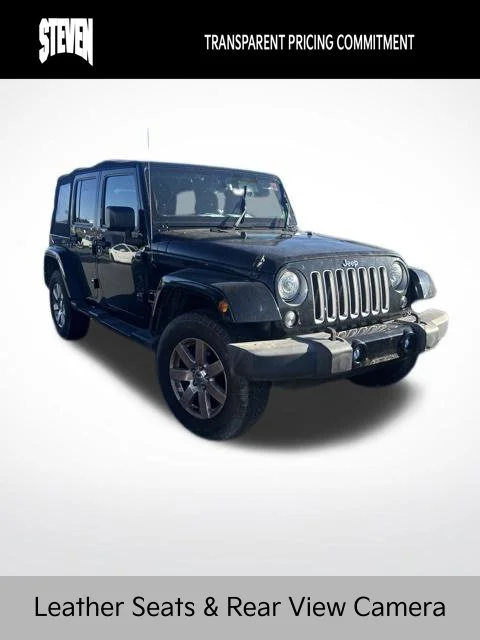 Used 2017 Black Jeep Unlimited Sahara image 1