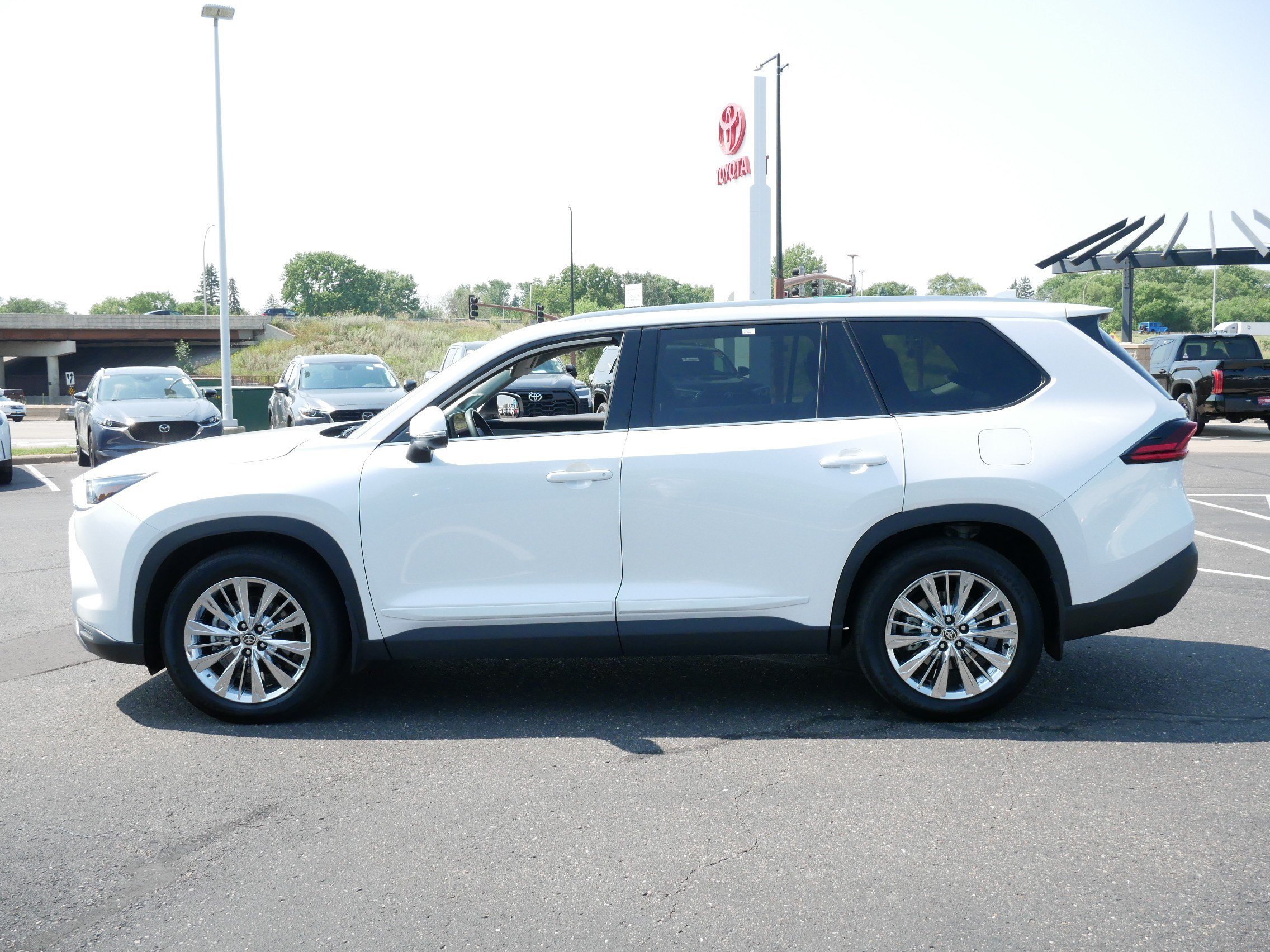 Certified 2025 Toyota Grand Highlander Platinum with VIN 5TDAAAB56SS074104 for sale in Brooklyn Center, Minnesota
