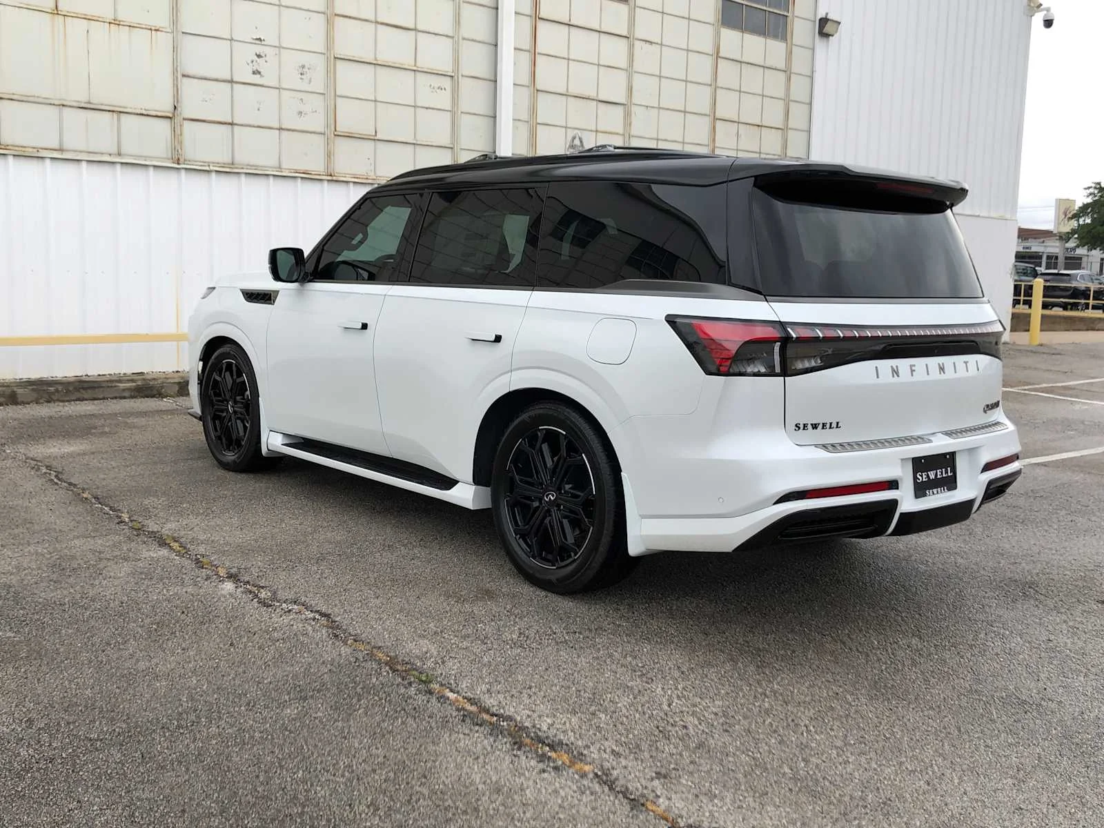 New 2026 RADIANT WHITE INFINITI Sport 4WD image 8