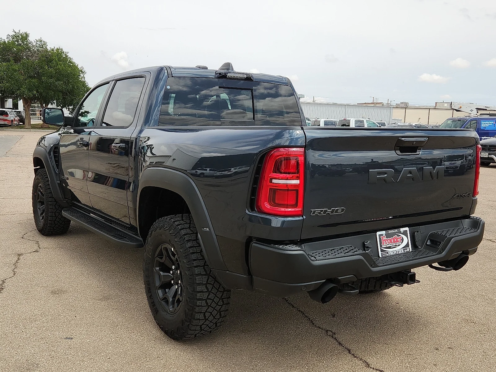 New 2026 Forged Blue Metallic  Paint Ram RHO CREW CAB 4X4 5