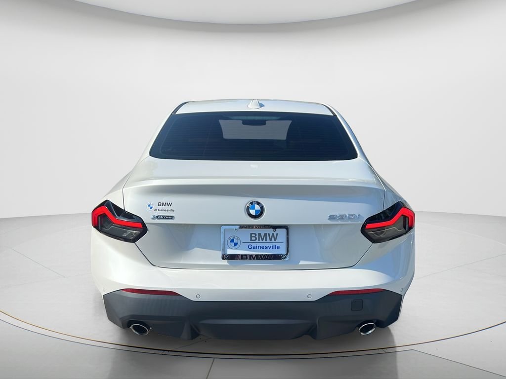 Certified Used 2023 Mineral White Metallic BMW 230i xDrive image 6