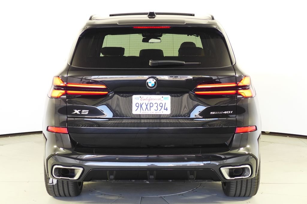Certified Used 2024 Black Sapphire Metallic BMW sDrive40i image 8