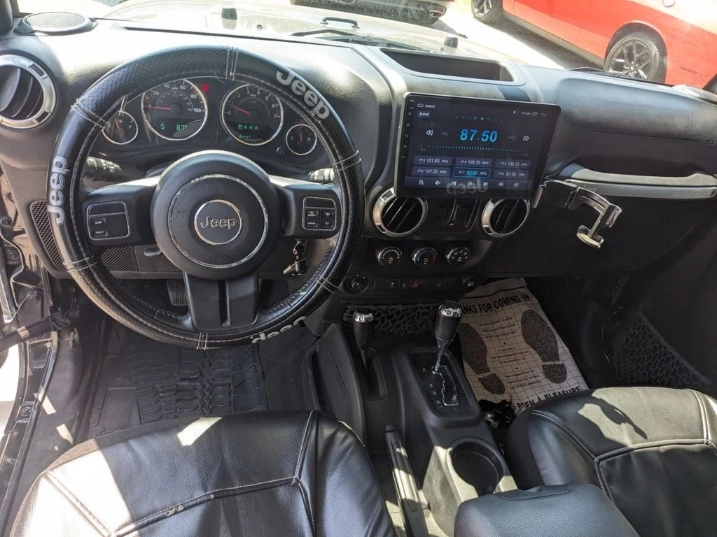 Used 2017 black Jeep 4d Convertible Sahara image 14