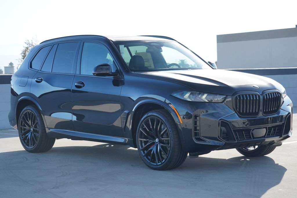 New 2026 Black Sapphire Metallic BMW sDrive40i image 3