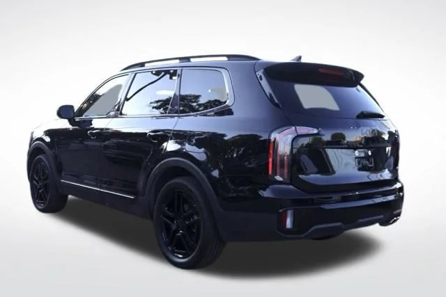 Used 2025 Black Kia EX X-Line image 9