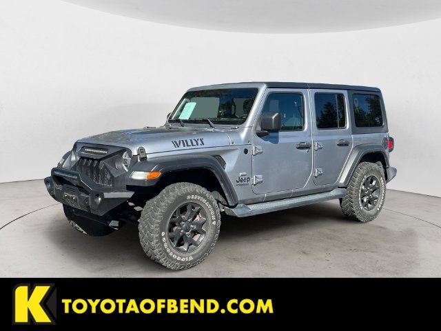 Used 2020 Silver Jeep Unlimited Sport image 1