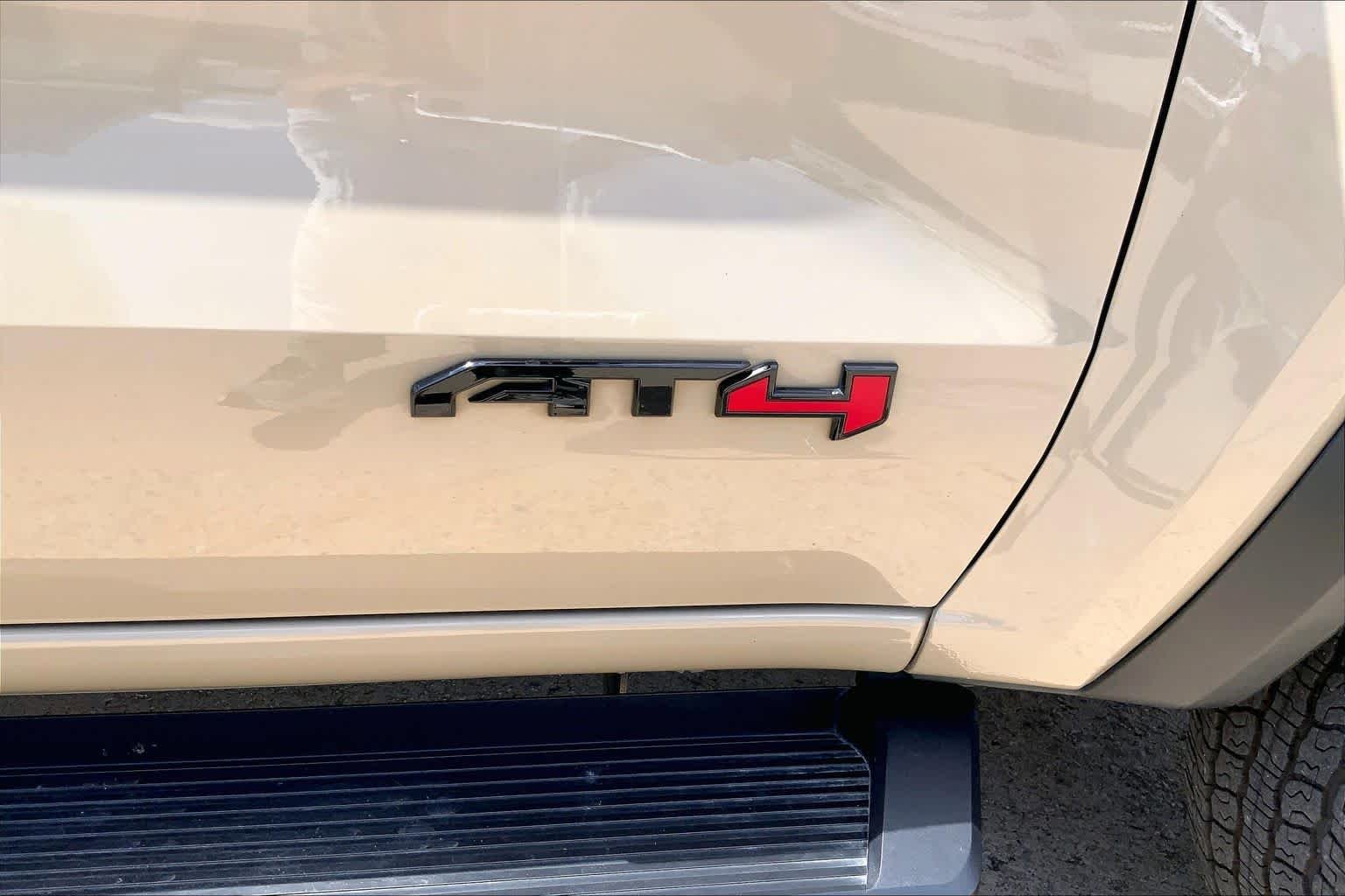 Used 2024 Desert Sand Metallic GMC 4WD AT4 image 10