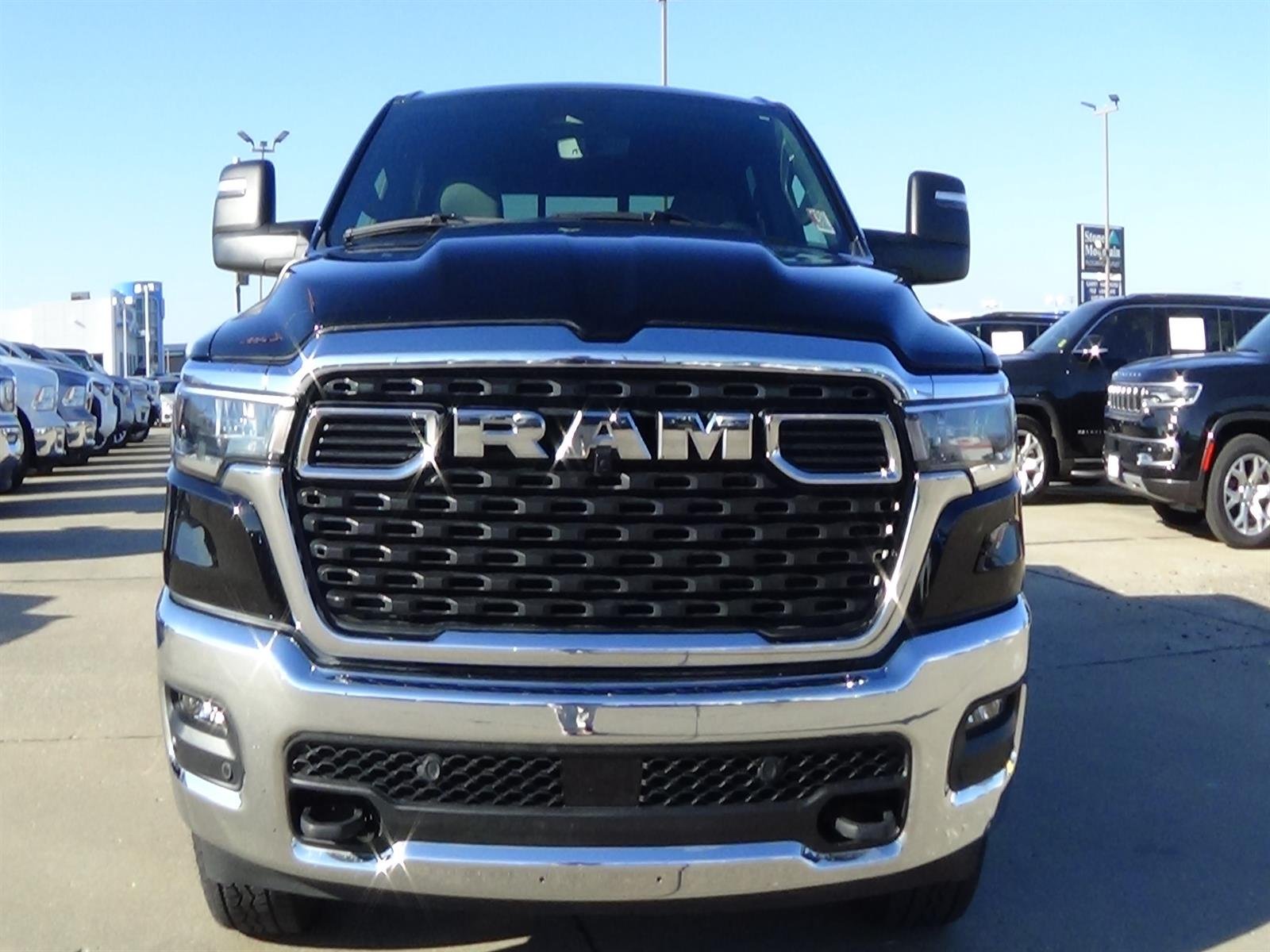 Used 2025 Diamond Black Crystal Pearl Coat (pxj) RAM Big Horn image 3
