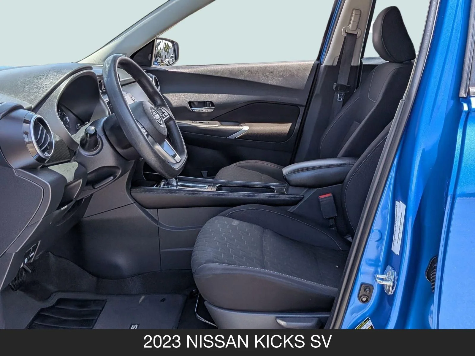 Used 2023 Electric Blue Metallic/Super Black Nissan SV image 14