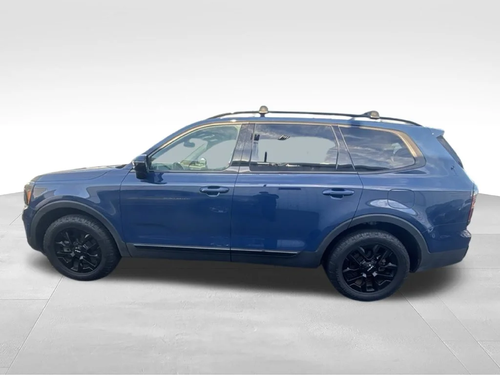 Certified Used 2024 Black Kia SX-Prestige X-Pro image 2