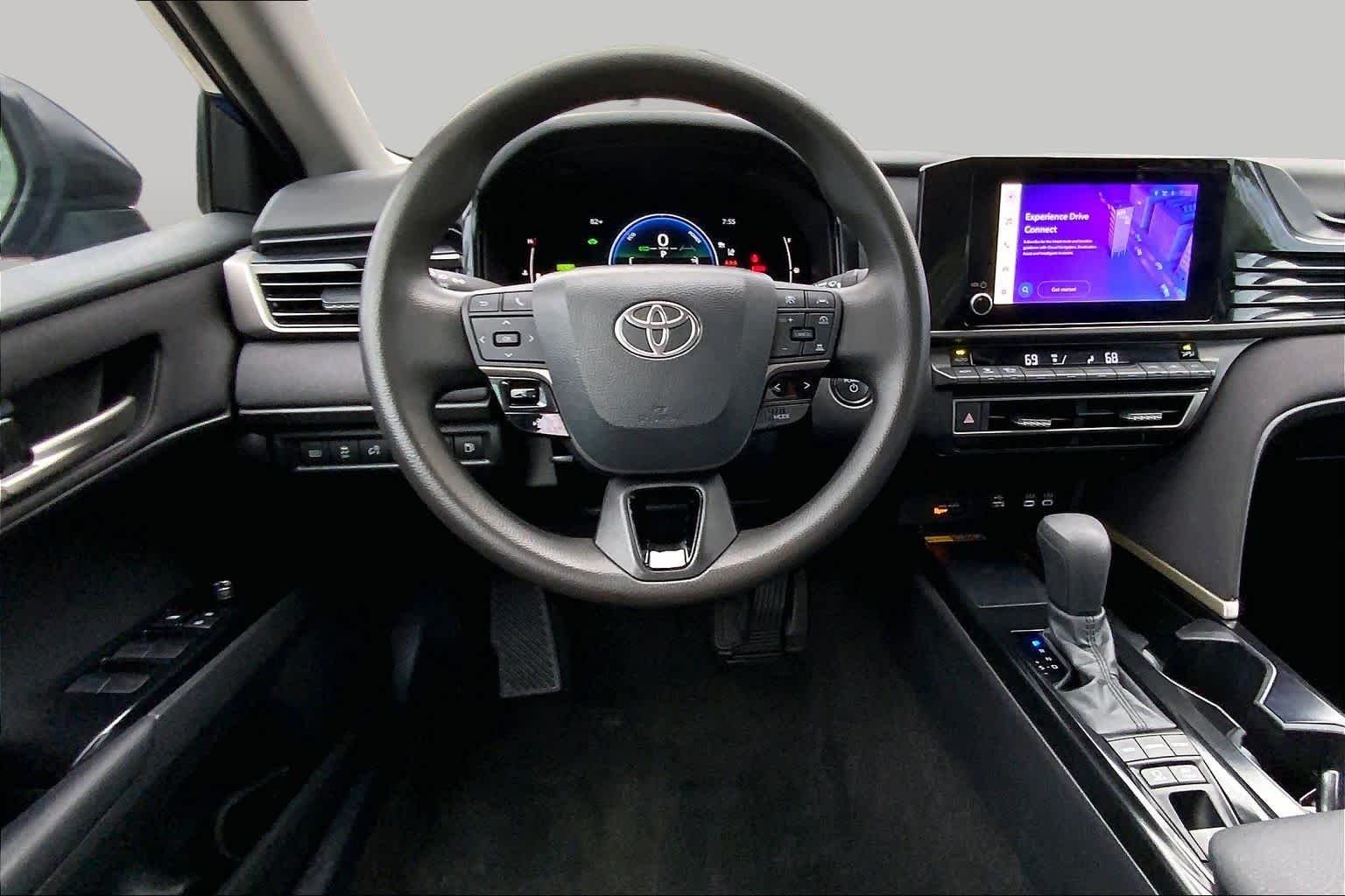 Used 2025 Reservoir Blue Toyota LE image 6
