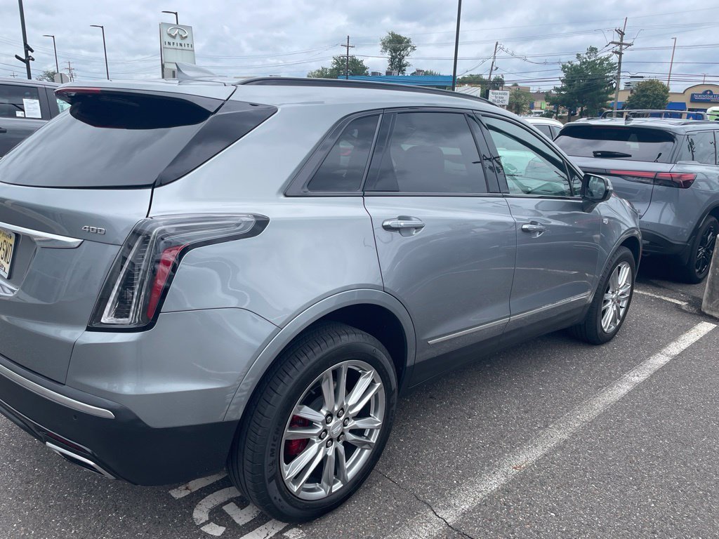 Used 2024 Argent Silver Metallic Cadillac Sport image 2