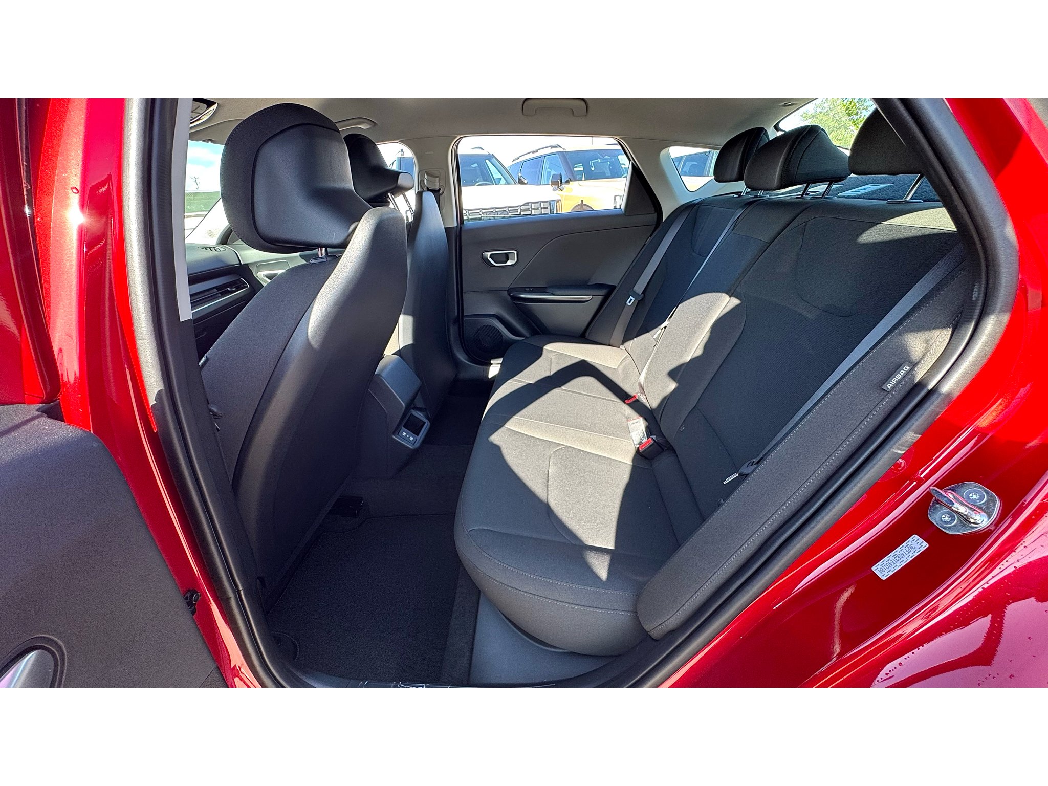 New 2026 Currant Red Kia LXS image 24