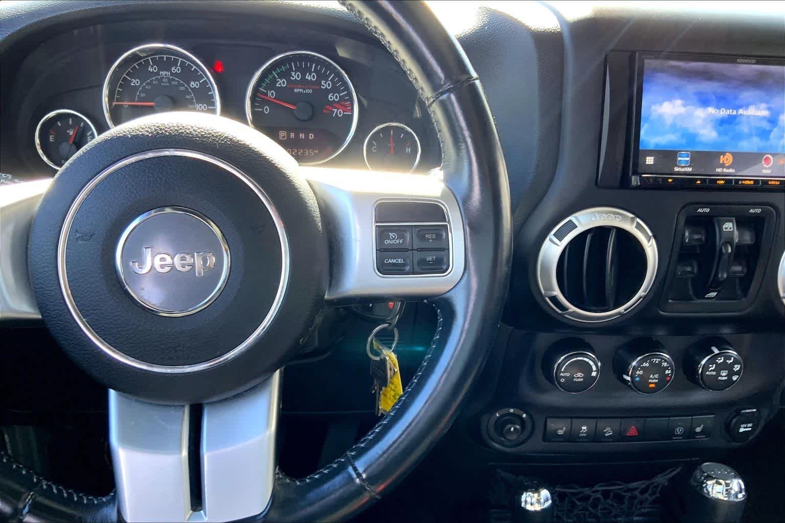 Used 2015 Billet Silver Metallic Clearcoat Jeep Rubicon Hard Rock image 24