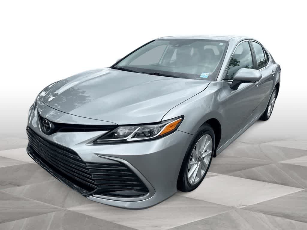 Used 2023 Celestial Silver Metallic Toyota LE image 1
