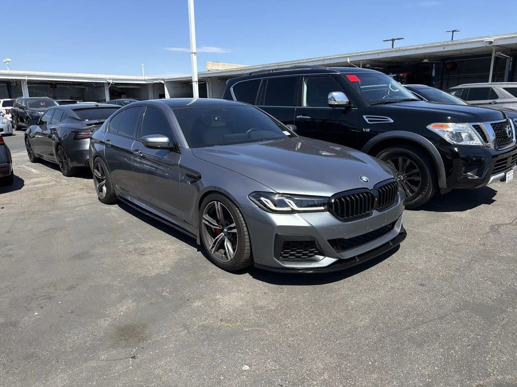 Used 2021 Bluestone Metallic BMW M550i xDrive image 4