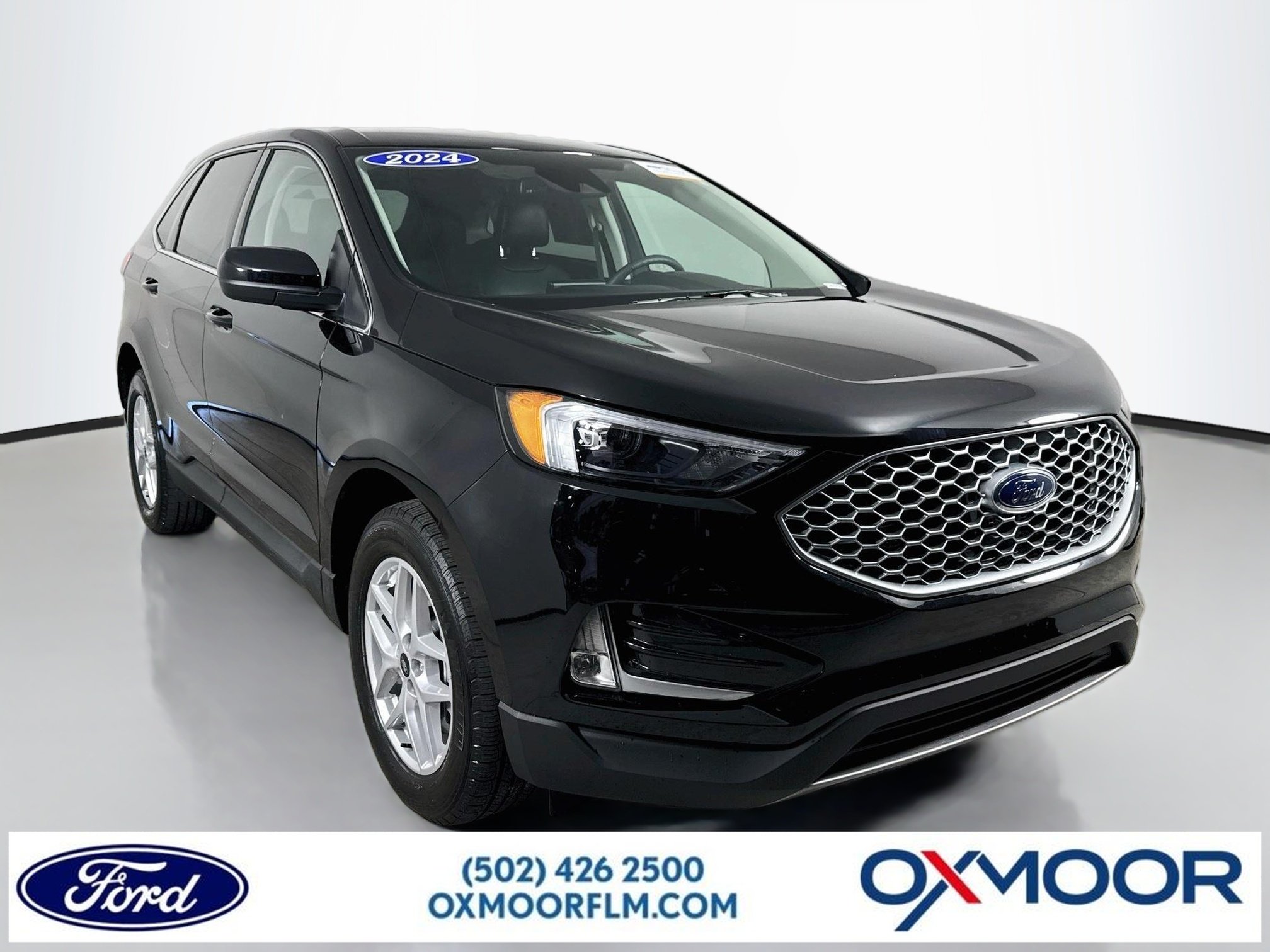 Used 2024 Agate Black Metallic Ford SEL image 1