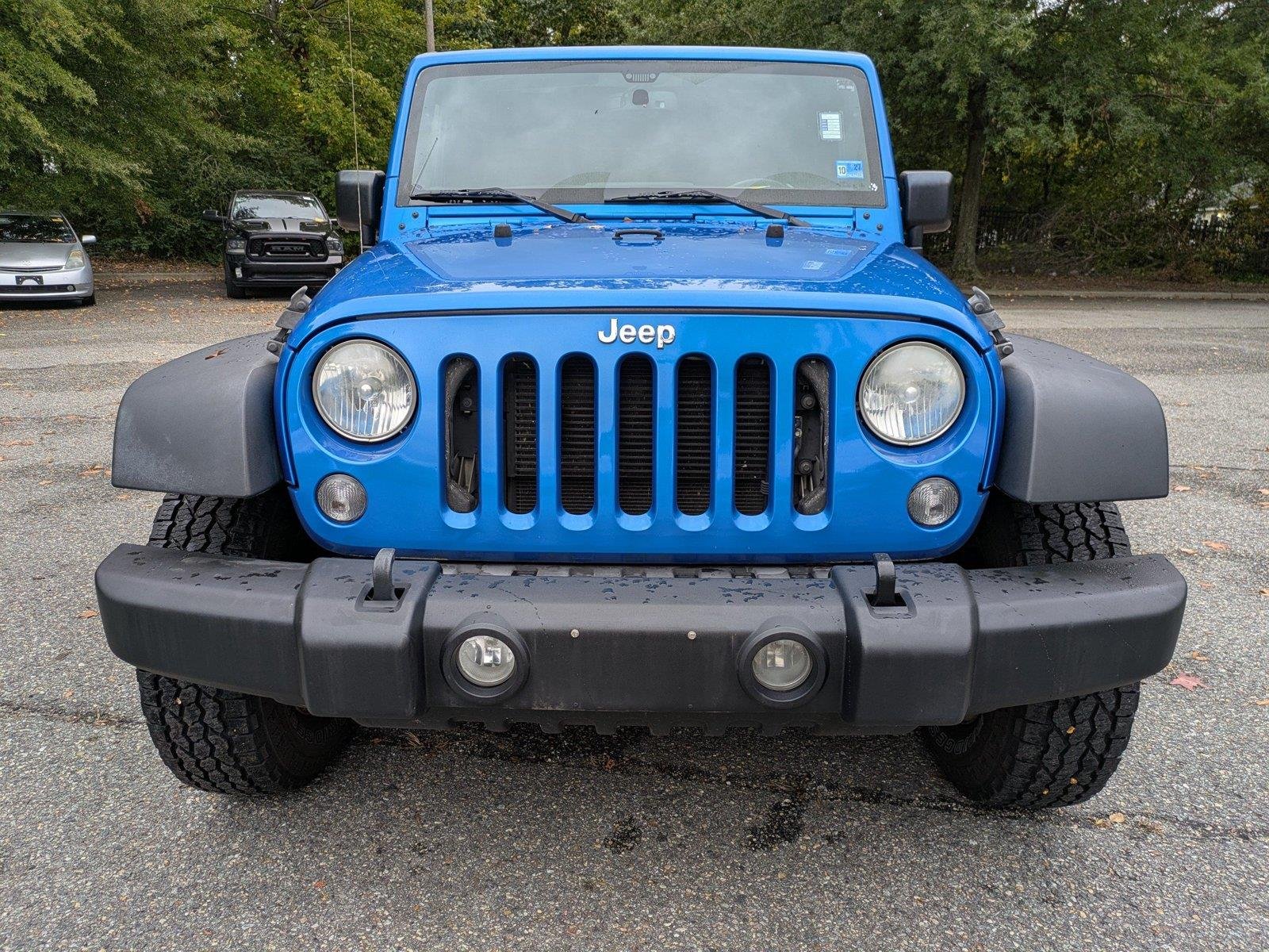 Used 2015 Hydro Blue Pearl Coat Jeep Sport image 9