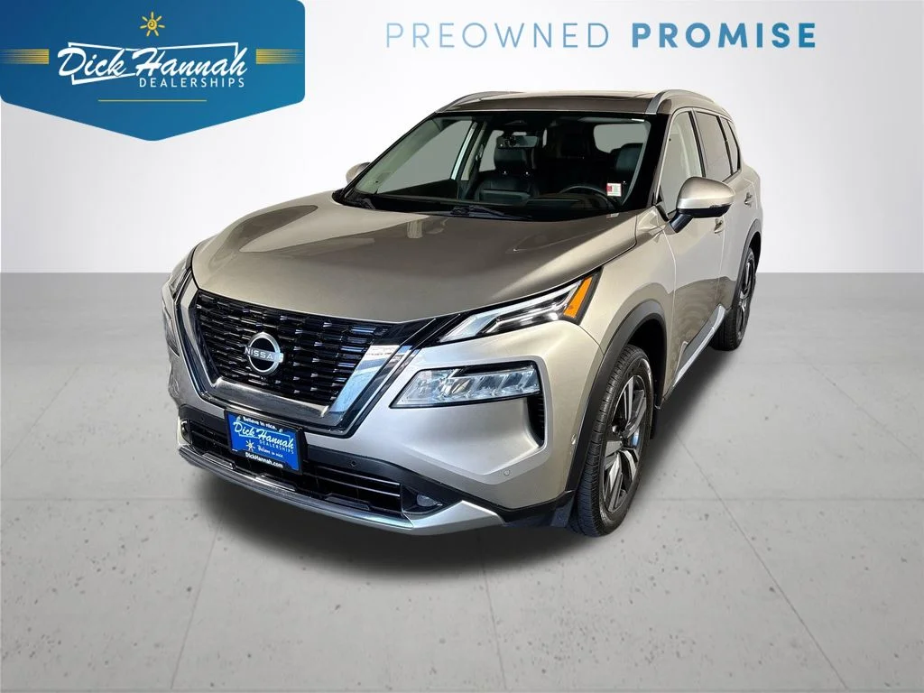Used 2023 Gold Nissan Platinum image 1