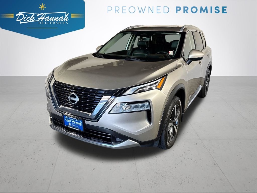 Used 2023 Gold Nissan Platinum image 1