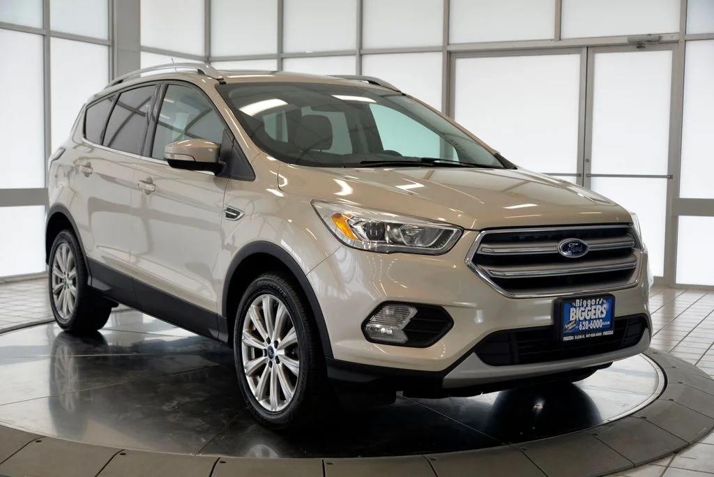 Used 2017 Ford Escape Titanium with VIN 1FMCU0J9XHUE33887 for sale in Elgin, IL