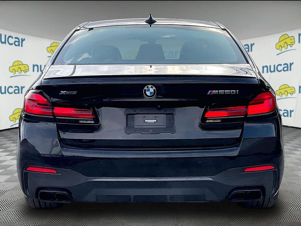 Used 2022 Black BMW M550i xDrive image 5