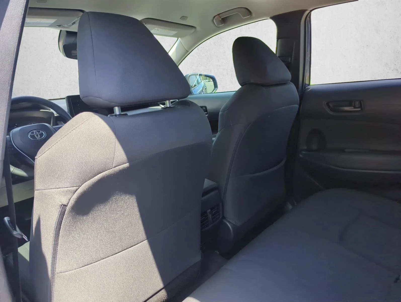 Used 2024 Blue Crush Metallic Toyota LE image 19