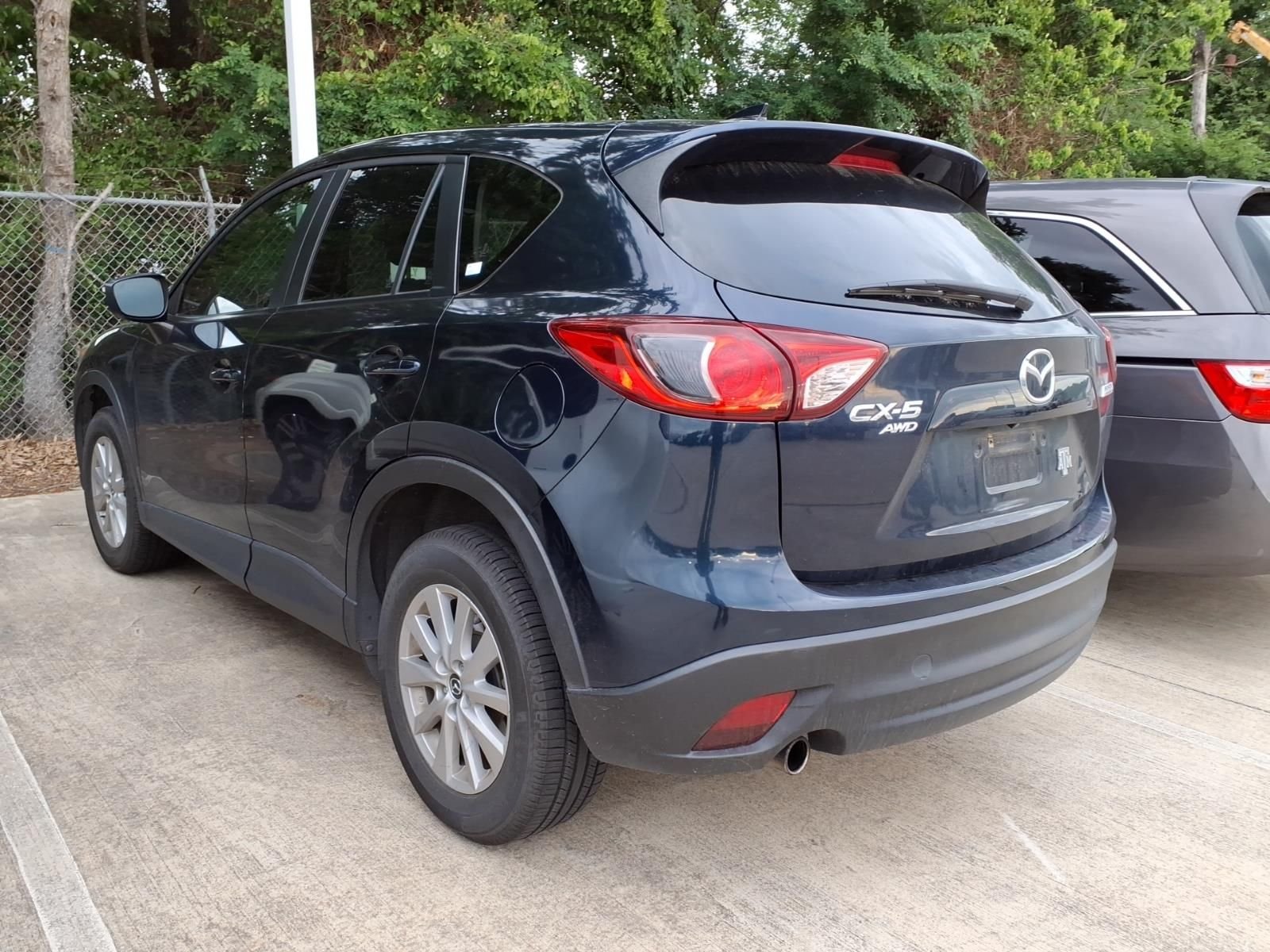 Used 2016 Mazda CX-5 Touring with VIN JM3KE4CYXG0661801 for sale in Conroe, TX