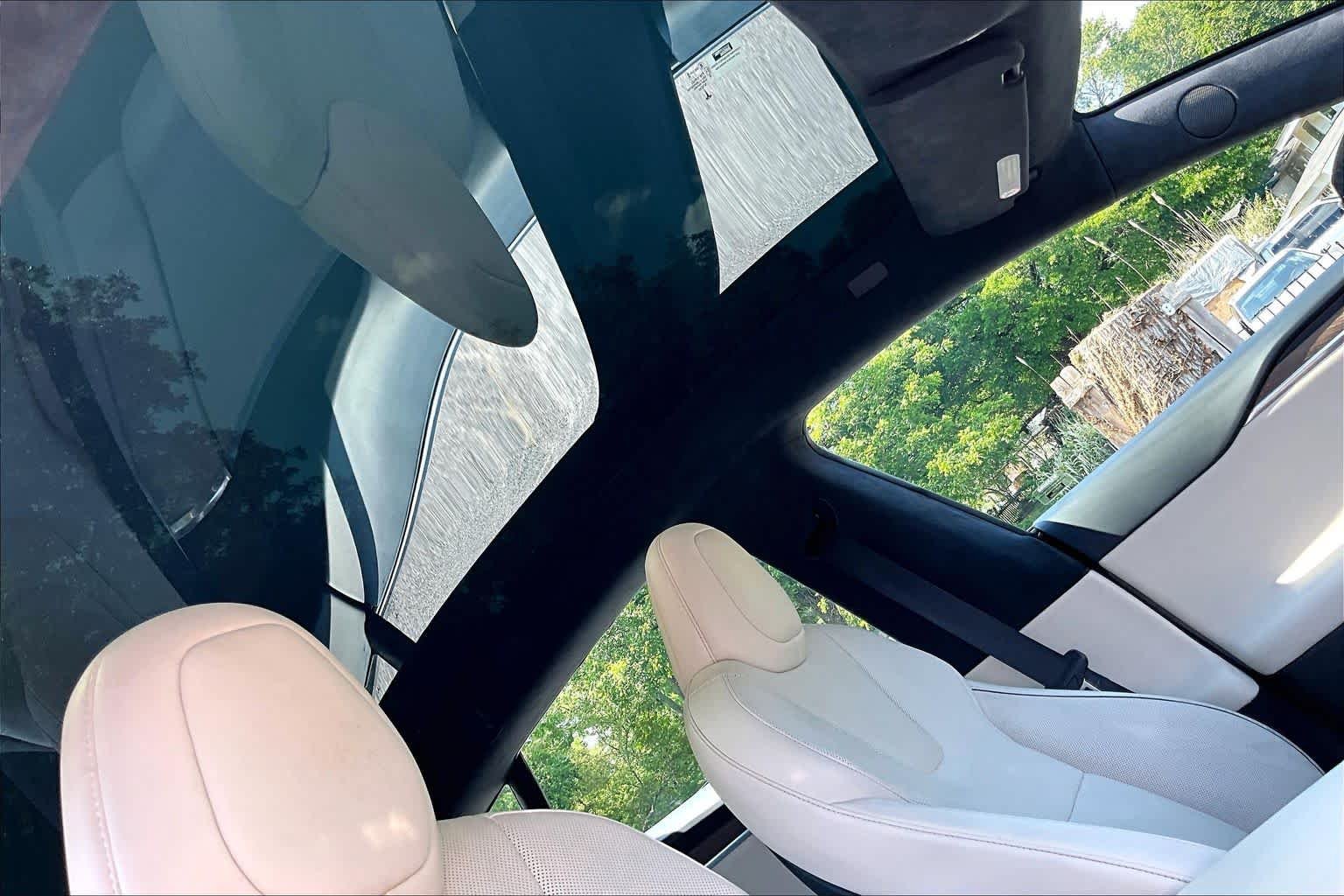 Used 2021 Solid Black Tesla Plaid image 13