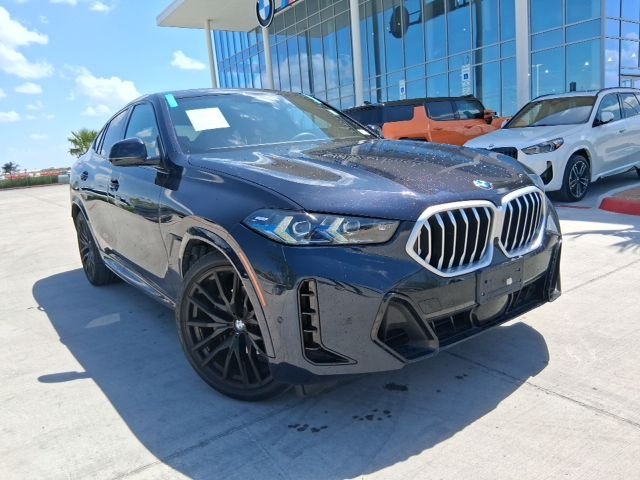 Used 2025 Black BMW xDrive40i image 1