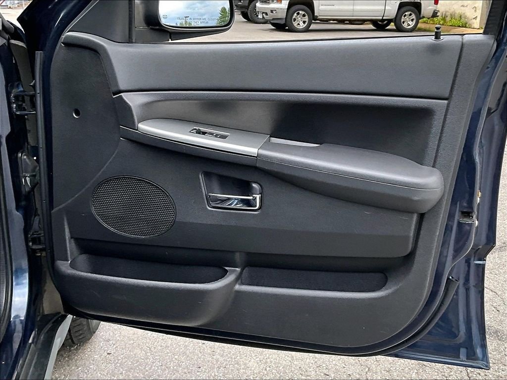 Used 2009 Modern Blue Pearlcoat Jeep Laredo image 12