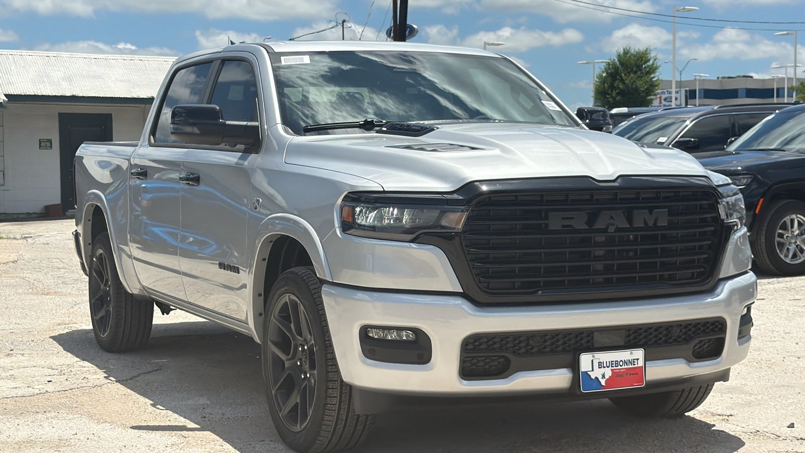New 2026 Silver Zynith Exterior Paint RAM Laramie image 3