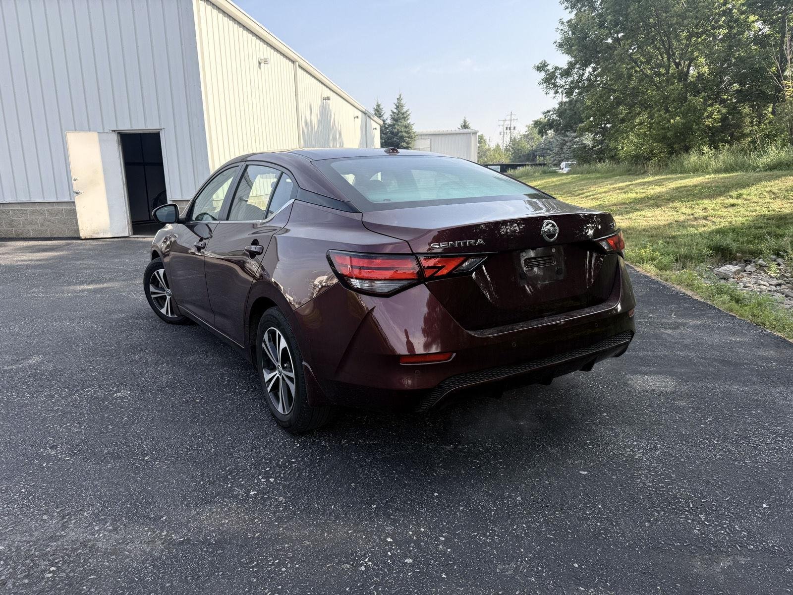Used 2023 Rosewood Metallic Nissan SV image 2