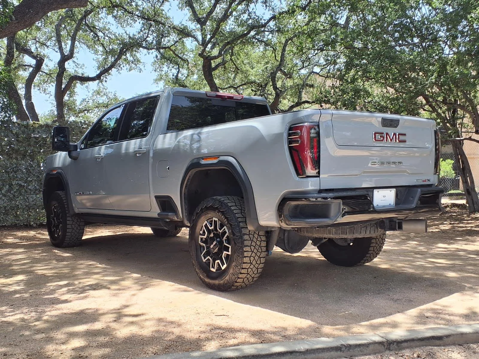 Used 2025 Thunderstorm Gray GMC AT4X image 5
