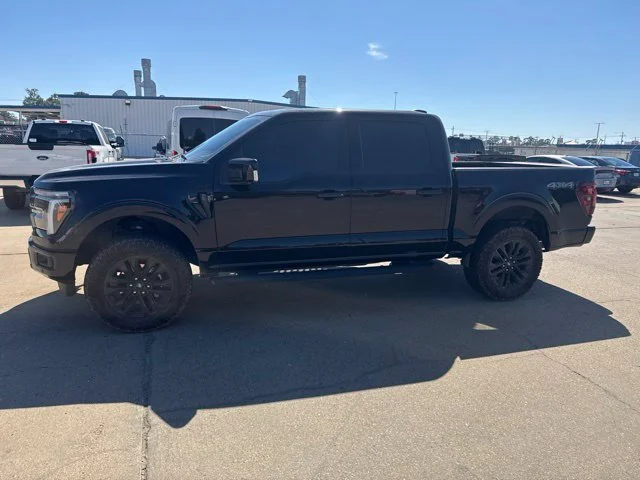 Used 2025 Agate Black Metallic Ford Lariat image 1